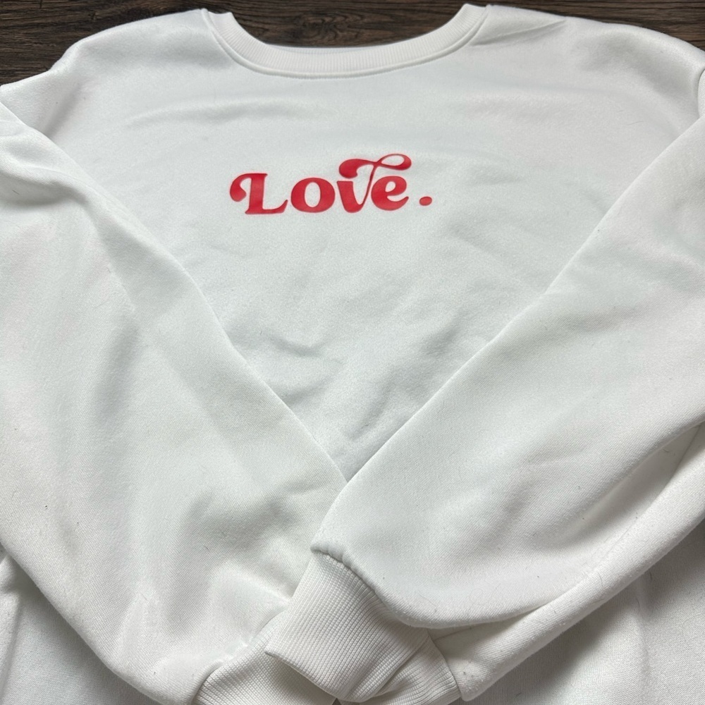 White Sweatshirt with Red 'Love' Print